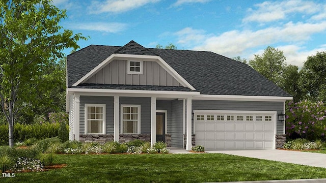 2000 Clydner Dr, Apex, NC 27523 - craftsman-style house featuring an attached garage, stone siding, a shingled roof, board and batten siding, and a front lawn