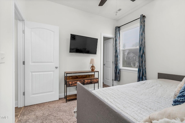 bedroom featuring baseboards and a ceiling fan