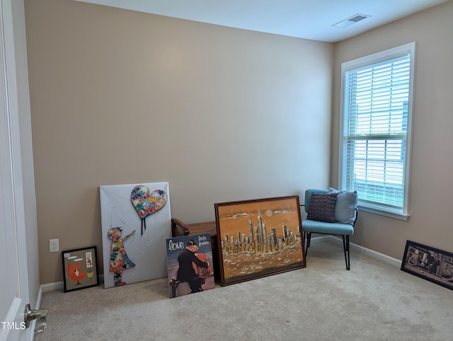 1033 Cuthbert Ln, Durham, NC 27703 - sitting room featuring carpet floors, healthy amount of natural light, and baseboards