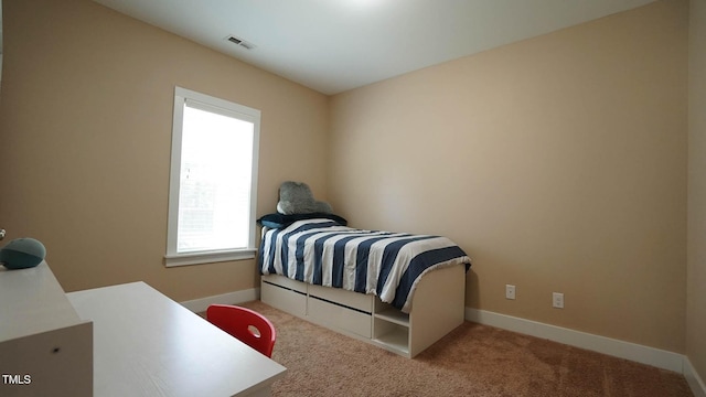 65 Wood Green Dr, Wendell, NC 27591 - bedroom featuring carpet, visible vents, and baseboards