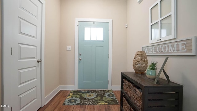 65 Wood Green Dr, Wendell, NC 27591 - foyer with baseboards and dark wood-style floors