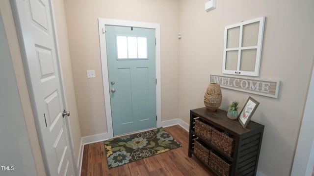 65 Wood Green Dr, Wendell, NC 27591 - entryway with baseboards and wood finished floors