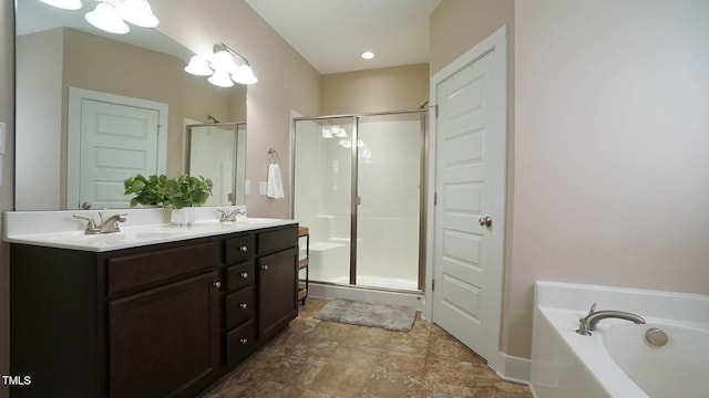 65 Wood Green Dr, Wendell, NC 27591 - full bath featuring double vanity, a garden tub, a shower stall, and a sink
