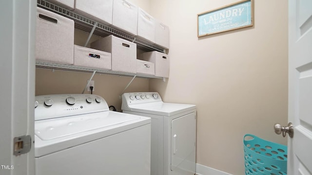 65 Wood Green Dr, Wendell, NC 27591 - laundry room with laundry area, baseboards, and separate washer and dryer