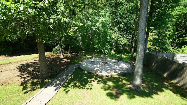65 Wood Green Dr, Wendell, NC 27591 - view of yard with an outdoor fire pit and fence