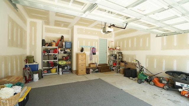 65 Wood Green Dr, Wendell, NC 27591 - garage featuring a garage door opener