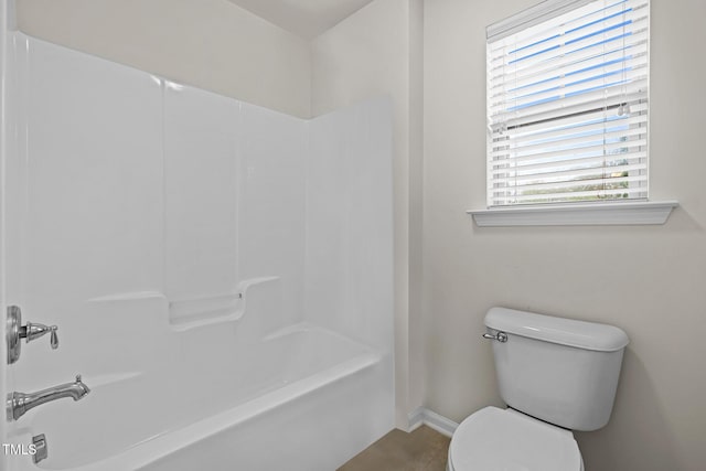 bathroom with toilet, baseboards,  shower combination, and tile patterned flooring
