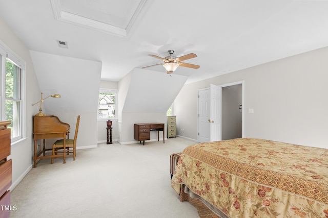 bedroom with light colored carpet, baseboards, a ceiling fan, and attic access