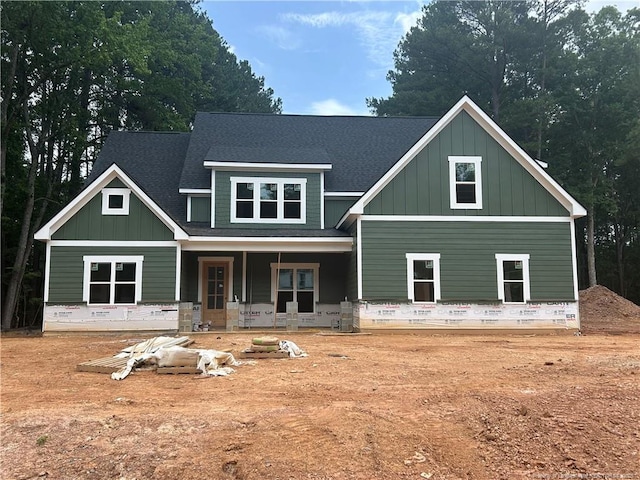 194 Landon Rdg, Sanford, NC 27330 - view of front of property with a porch, a shingled roof, and board and batten siding