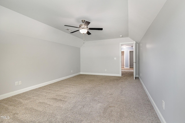 91 Carsons Creek Trl, Wendell, NC 27591 - unfurnished bedroom featuring carpet flooring, lofted ceiling, baseboards, and ceiling fan