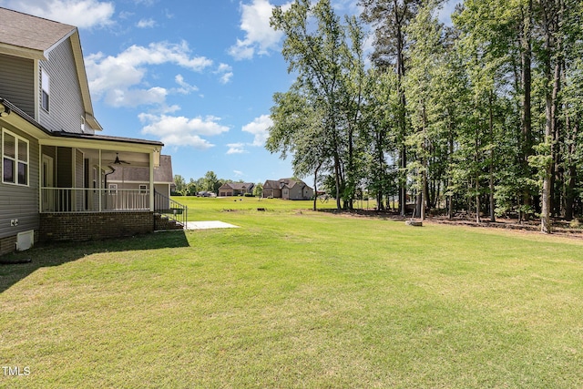 91 Carsons Creek Trl, Wendell, NC 27591 - view of green lawn featuring a ceiling fan