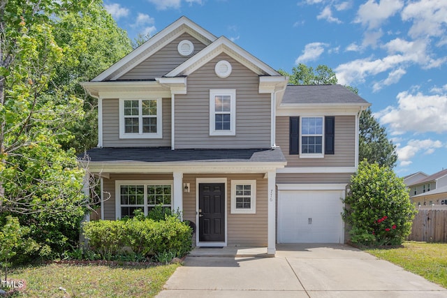 776 Averasboro Dr, Clayton, NC 27520 - view of front facade featuring fence, an attached garage, concrete driveway, a porch, and roof with shingles