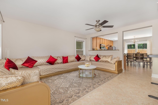 776 Averasboro Dr, Clayton, NC 27520 - living area featuring ceiling fan with notable chandelier