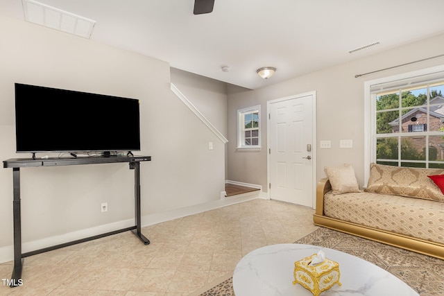 776 Averasboro Dr, Clayton, NC 27520 - living room with ceiling fan, baseboards, visible vents, and tile patterned floors