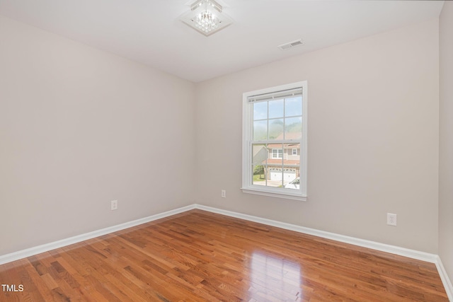 776 Averasboro Dr, Clayton, NC 27520 - unfurnished room with baseboards, visible vents, and wood finished floors