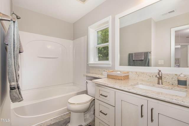 776 Averasboro Dr, Clayton, NC 27520 - full bathroom with toilet, vanity, visible vents, and shower / tub combination