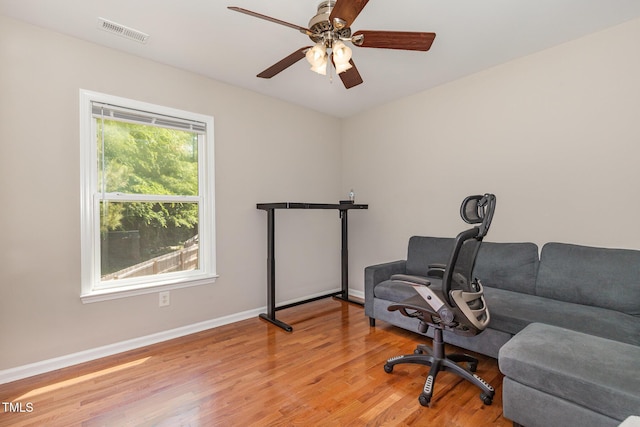 776 Averasboro Dr, Clayton, NC 27520 - home office with a ceiling fan, baseboards, light wood finished floors, and visible vents