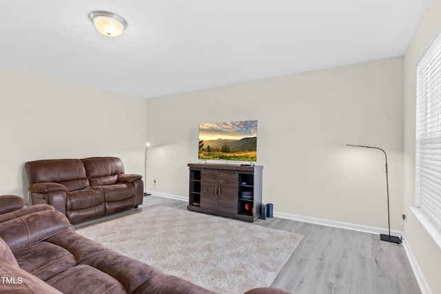 4108 Lady Slipper Ln, Durham, NC 27704 - living area with wood finished floors and baseboards