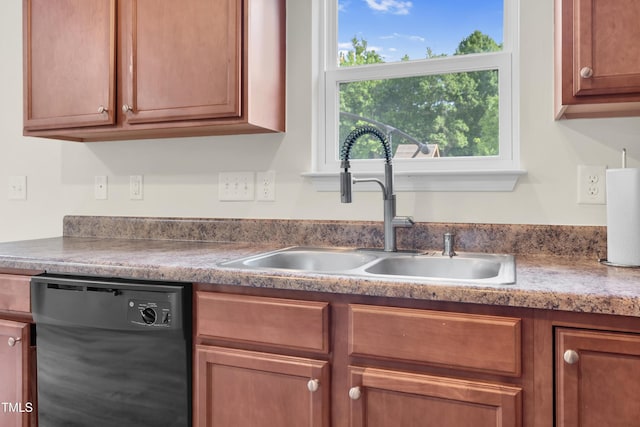 4108 Lady Slipper Ln, Durham, NC 27704 - kitchen featuring black dishwasher, a sink, and brown cabinets