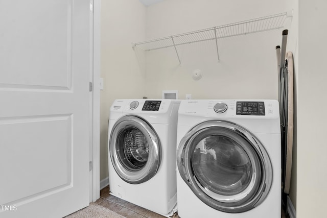 4108 Lady Slipper Ln, Durham, NC 27704 - washroom featuring separate washer and dryer and tile patterned floors