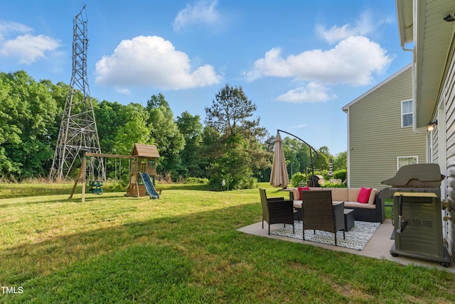 4108 Lady Slipper Ln, Durham, NC 27704 - view of green lawn featuring outdoor lounge area, a patio area, and a playground