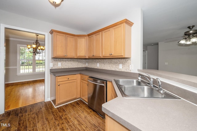 kitchen with stainless steel dishwasher, a sink, dark wood-style flooring, a chandelier, and decorative backsplash