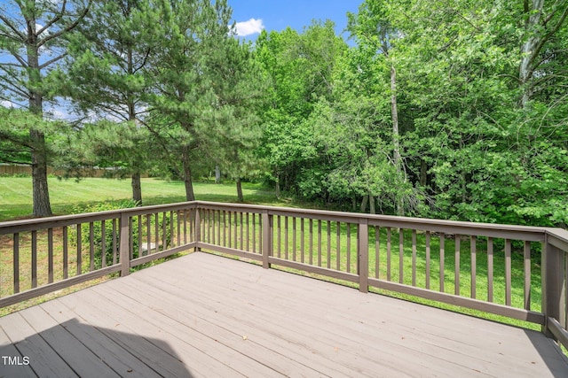 deck featuring a lawn