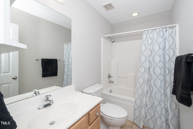 bathroom featuring toilet, vanity, and shower / bath combo with shower curtain