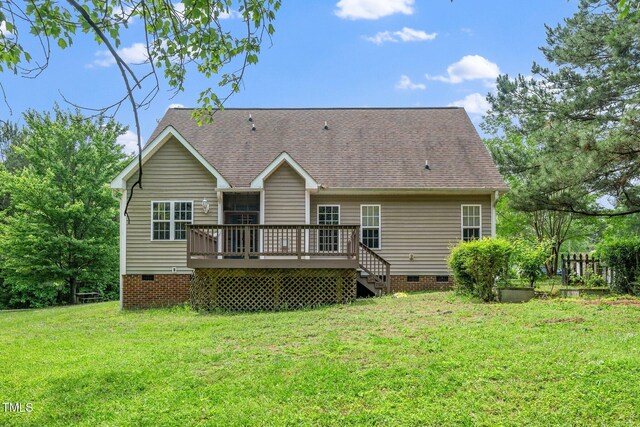 rear view of property with crawl space, a wooden deck, and roof with shingles