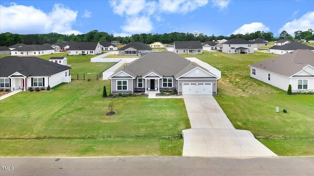 5082 Dogwood Dr, Battleboro, NC 27809 - view of front of property featuring a residential view, driveway, and a garage