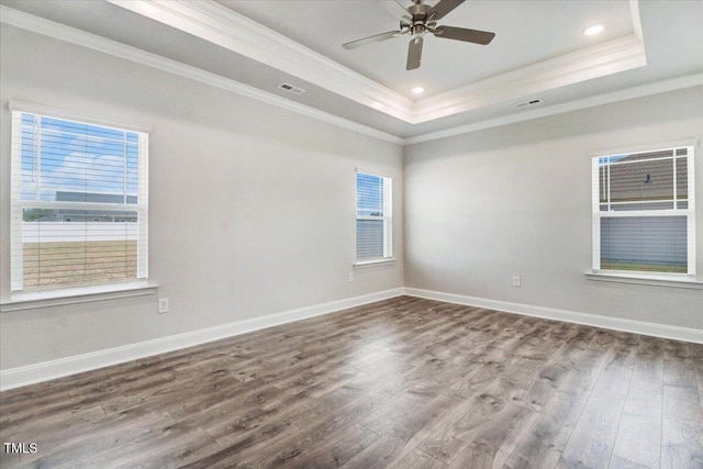 5082 Dogwood Dr, Battleboro, NC 27809 - spare room with crown molding, wood finished floors, a raised ceiling, a ceiling fan, and baseboards
