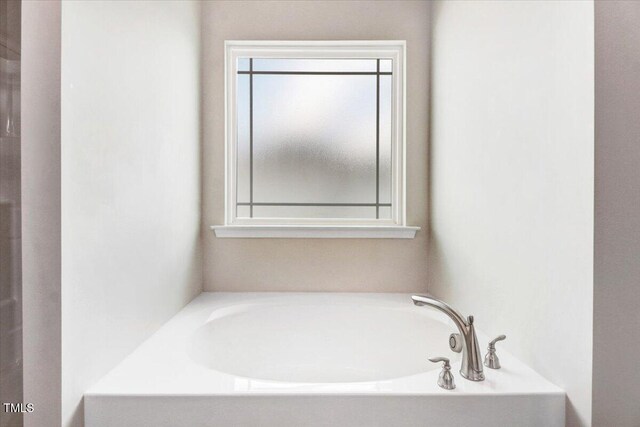 5082 Dogwood Dr, Battleboro, NC 27809 - full bathroom featuring a bath
