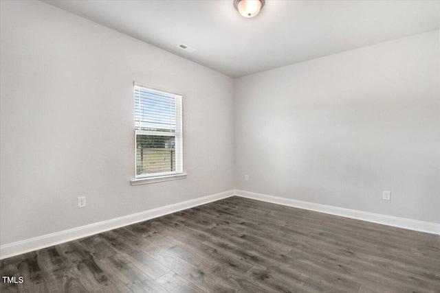 5082 Dogwood Dr, Battleboro, NC 27809 - unfurnished room featuring dark wood-style flooring and baseboards