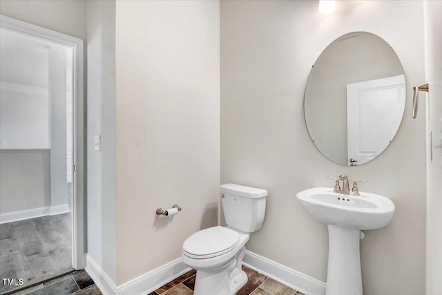 5082 Dogwood Dr, Battleboro, NC 27809 - bathroom with toilet and baseboards