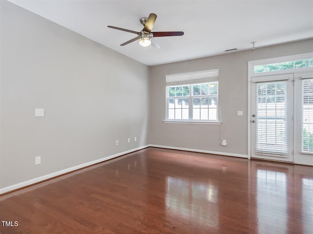 8219 Martello Ln, Raleigh, NC 27613 - unfurnished room with baseboards, ceiling fan, and wood finished floors