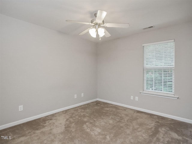 8219 Martello Ln, Raleigh, NC 27613 - empty room featuring a ceiling fan, carpet flooring, visible vents, and baseboards