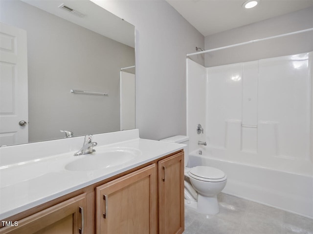 8219 Martello Ln, Raleigh, NC 27613 - full bathroom with toilet, vanity, visible vents, tile patterned floors, and  shower combination