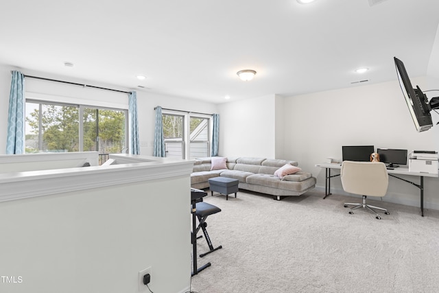 interior space featuring carpet flooring, baseboards, visible vents, and recessed lighting