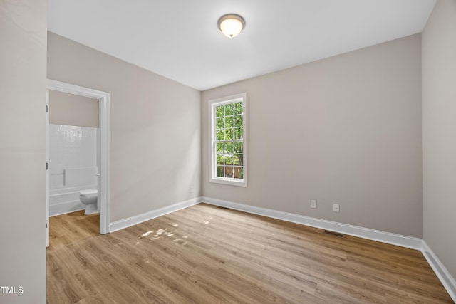 120 Hatchet Creek Ct, Morrisville, NC 27560 - empty room with wood finished floors and baseboards