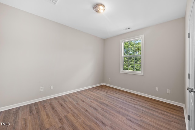 120 Hatchet Creek Ct, Morrisville, NC 27560 - empty room with baseboards and wood finished floors