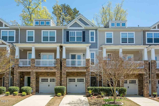 8016 Sycamore Hill Ln, Raleigh, NC 27612 - townhome / multi-family property featuring a garage and driveway