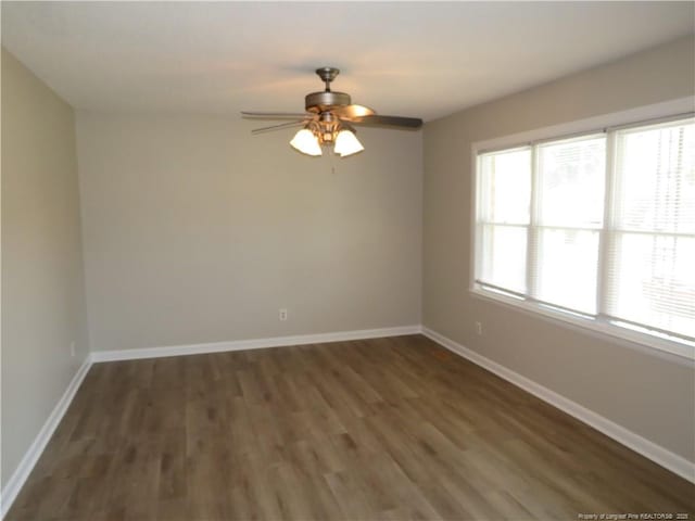 6324 Brussels Ct, Fayetteville, NC 28304 - empty room with a ceiling fan, baseboards, and wood finished floors