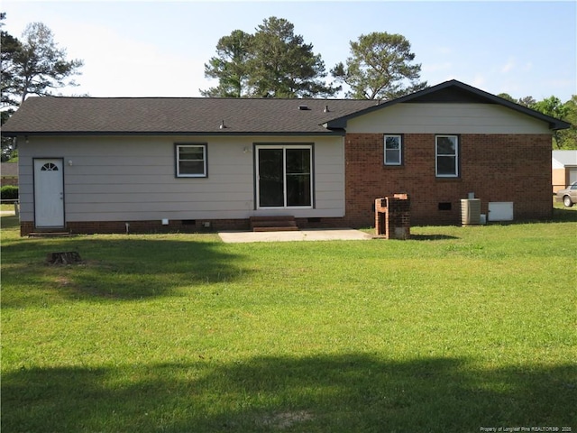 6324 Brussels Ct, Fayetteville, NC 28304 - back of property with a lawn, central AC unit, a patio, and crawl space