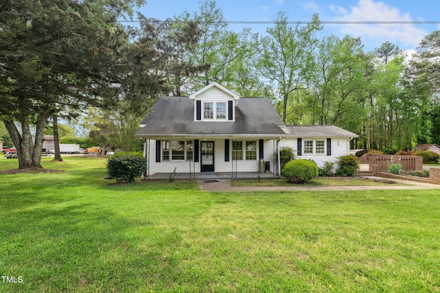 183 Red Hill Loop Rd, Warrenton, NC 27589 - cape cod-style house featuring covered porch and a front yard