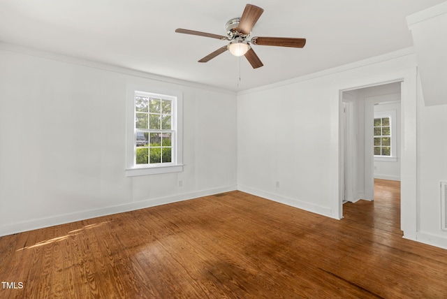 183 Red Hill Loop Rd, Warrenton, NC 27589 - spare room featuring wood finished floors, visible vents, crown molding, a ceiling fan, and baseboards
