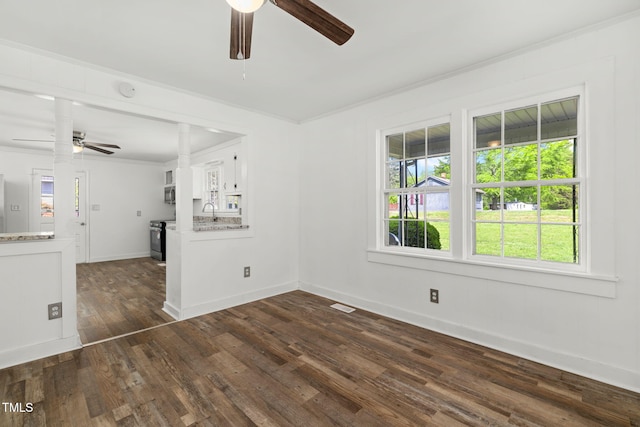 183 Red Hill Loop Rd, Warrenton, NC 27589 - unfurnished living room featuring baseboards, dark wood-style flooring, visible vents, and ceiling fan