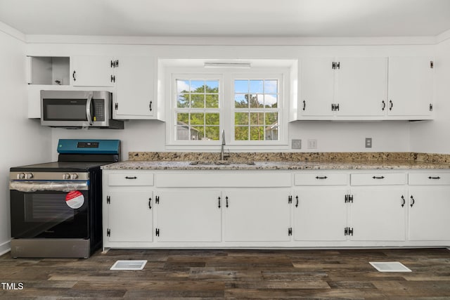 183 Red Hill Loop Rd, Warrenton, NC 27589 - kitchen featuring a sink, stainless steel appliances, and white cabinets