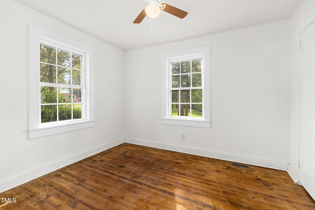 183 Red Hill Loop Rd, Warrenton, NC 27589 - empty room with baseboards, visible vents, ceiling fan, and dark wood-type flooring