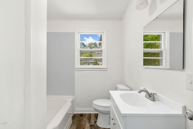 183 Red Hill Loop Rd, Warrenton, NC 27589 - bathroom featuring toilet, a bath, vanity, crown molding, and wood finished floors