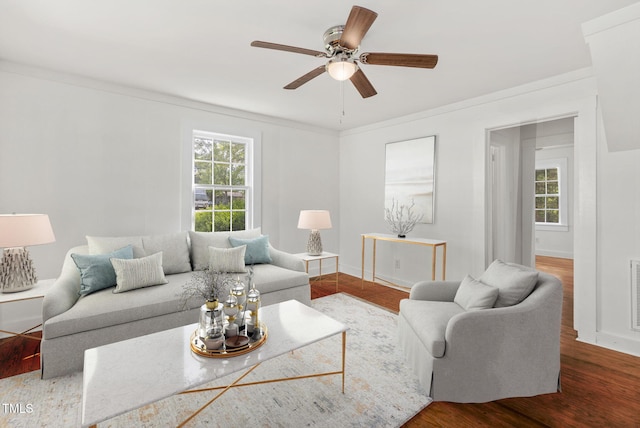 183 Red Hill Loop Rd, Warrenton, NC 27589 - living room featuring a ceiling fan, baseboards, ornamental molding, visible vents, and wood finished floors